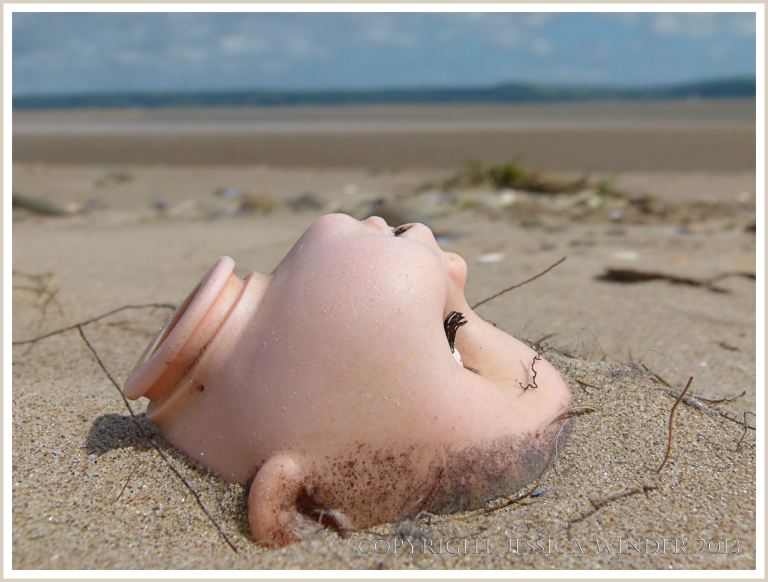 Doll's head washed ashore  as flotsam