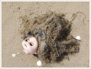 Doll's head washed ashore as flotsam