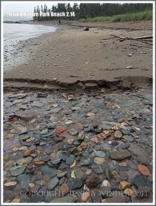 Stream with pebbles on a New Brunswick beach