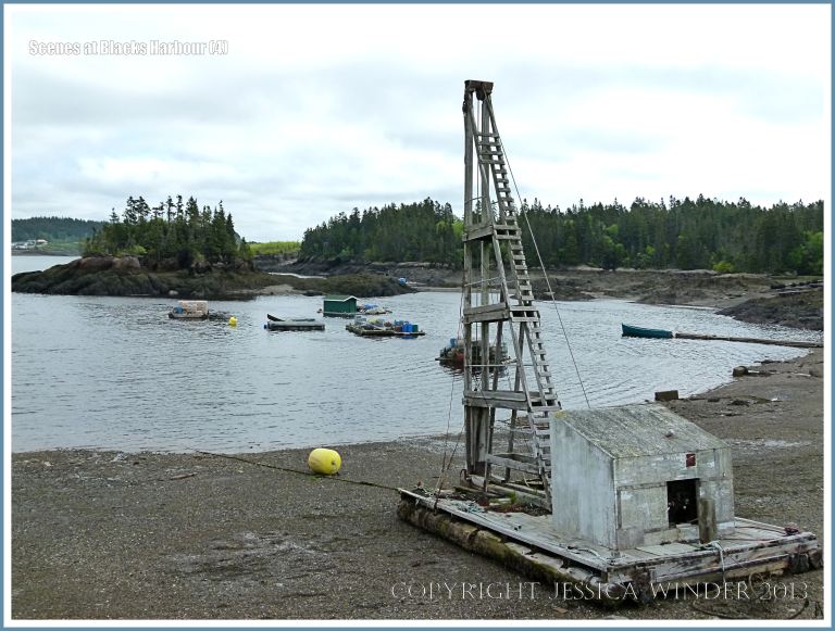 Old wooden winch or crane on the beach at Blacks Harbour