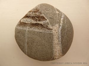 Beach stone with a pattern
