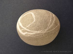 Beach stone with a pattern