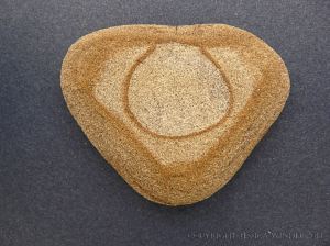 Beach stone with a pattern