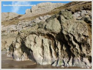 Sand covered beach at Mewslade Bay prior to winter storms
