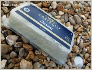 Flotsam tub of cheese washed ashore at Ringstead Bay