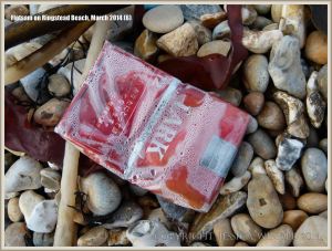 Flotsam packet of cigarettes washed ashore at Ringstead Bay
