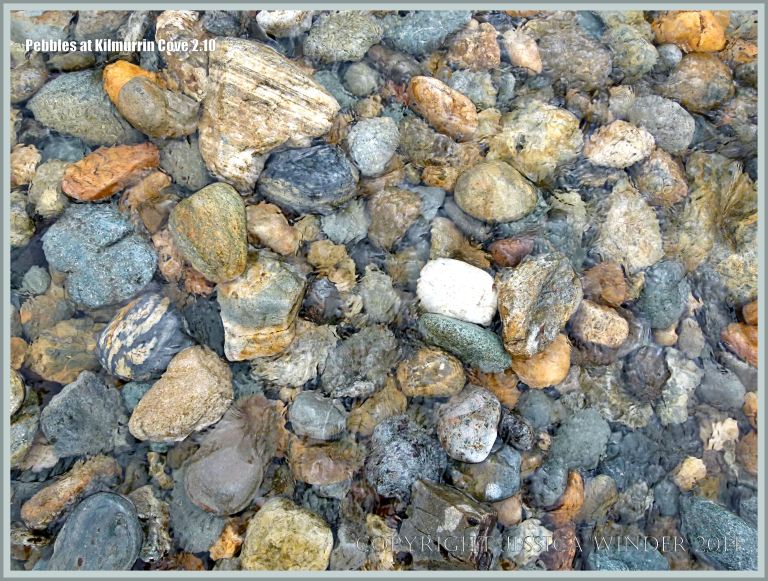 Pebbles underwater in a beach stream