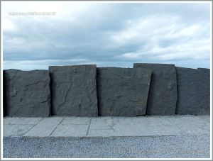 Liscannor flags with Olivellite trace fossils in a wall at the Cliffs of Moher