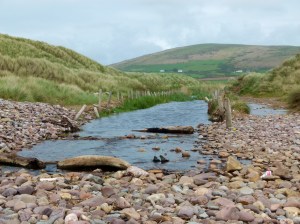 Storm bank of pebbles blocking the Diles Lake