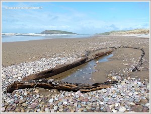 Shipwrecked wooden boat on the beach