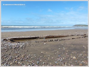 Shipwrecked wooden boat on the beach