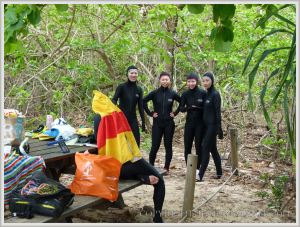 Young girls in stinger suits on Normanby Island.