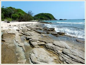 Layers of modern "beach rock" or cay sandstone on Normanby Island