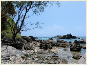View of the rocky end of Normanby Island
