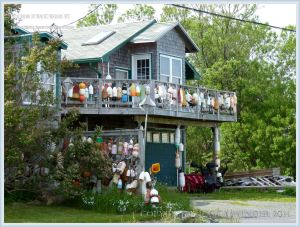 House decorated with fishing floats on Grand Manan