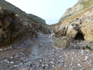 View looking from Mewslade Bay to the narrow fault gully entrance