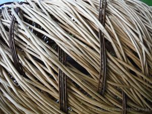 Close-up of the basketwork weaving of a larger than life willow sculpture of fungi by Tom Hare