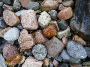 Wet pebbles on the beach