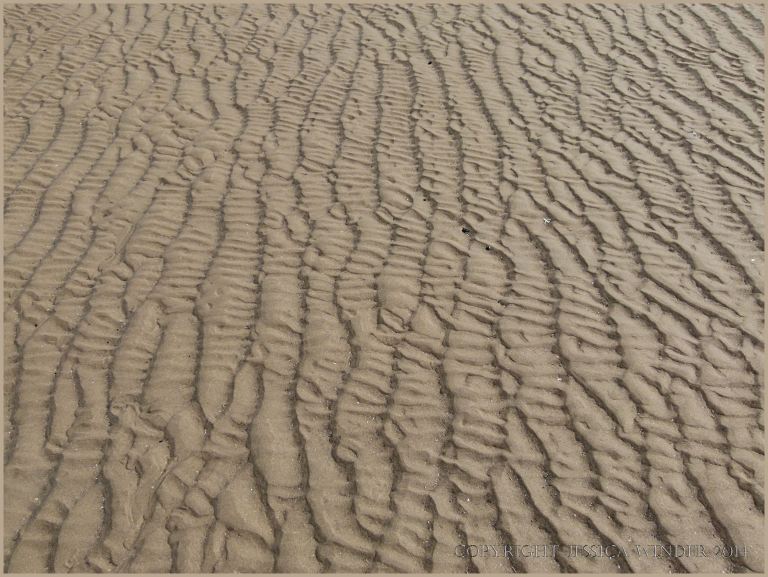 Natural sand ripple patterns on the beach