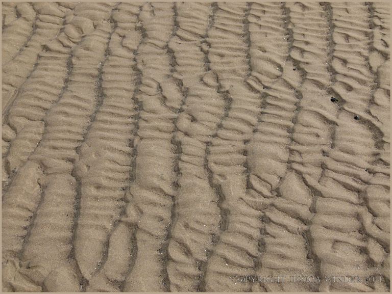 Natural sand ripple patterns on the beach