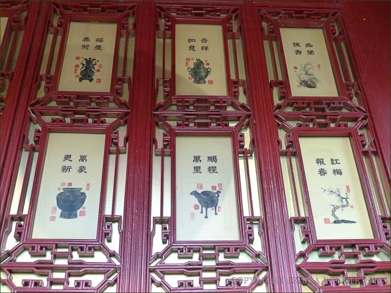 Red-painted interior woodwork in a pavilion at the Chinese Garden in Montreal