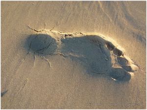 Footprint in the sand at Rhossili Beach