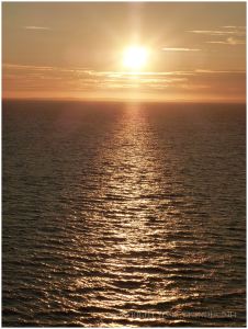 Lowering sun over Rhossili Bay