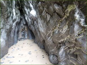 A cave in Hunts Bay Oolite Subgroup Carboniferous Limestone at South Beach in Tenby