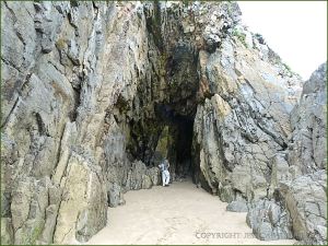 Entrance to a larger cave on South Beach in Tenby
