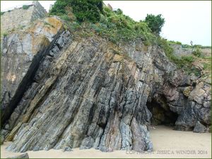 Entrance to a large cave in Caswell Bay Mudstones in Tenby