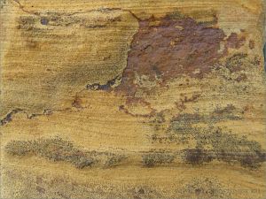 Rock pattern and texture in a beach boulder