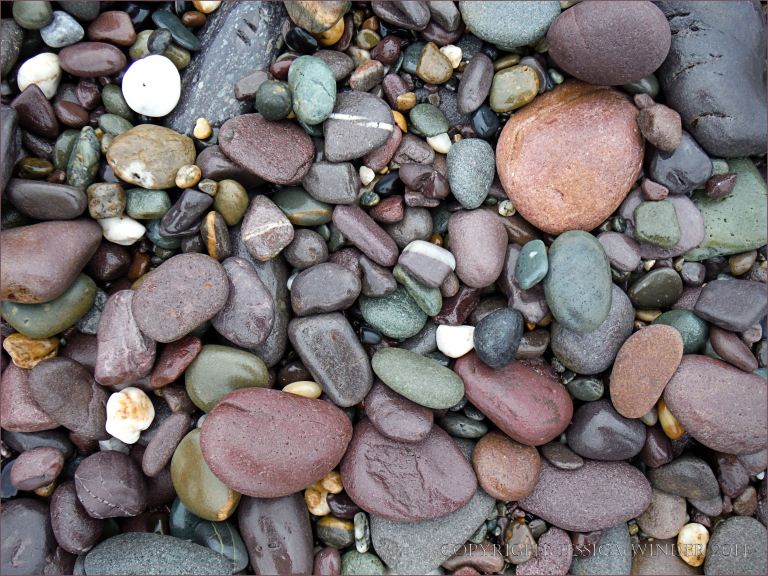 Pebbles of many colours on the beach