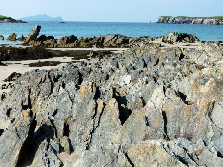 Layers of upstanding Silurian rock on the beach