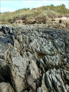 Texture, colour, and pattern in Silurian rock strata on the beach at Ferriters Cove