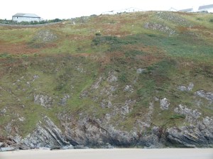 View of Rhossili cliffs from beach below the village.
