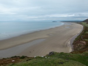 View of Rhossili beach looking towards Burry Holms