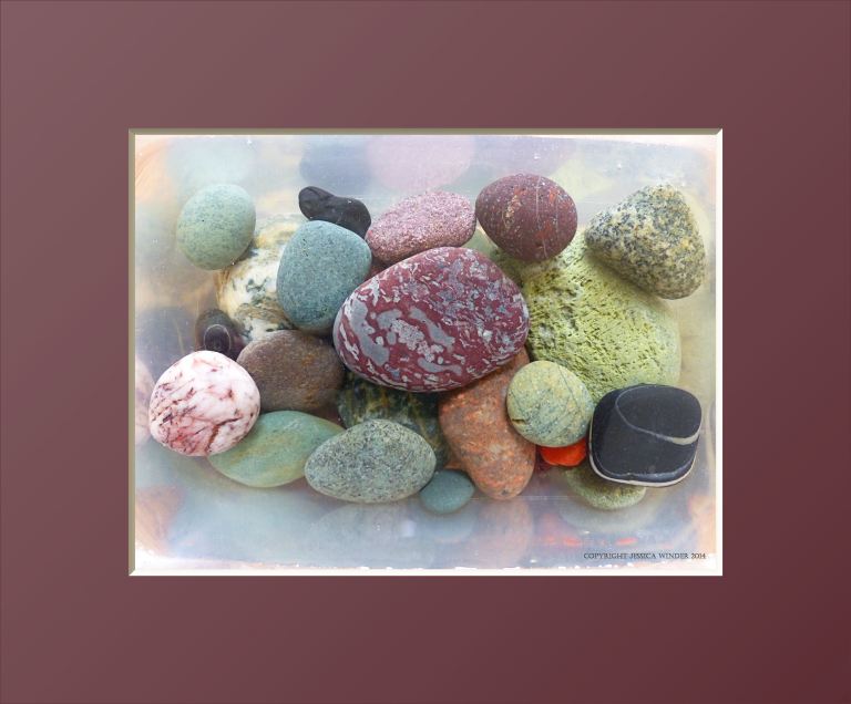 Colourful red and green pebbles