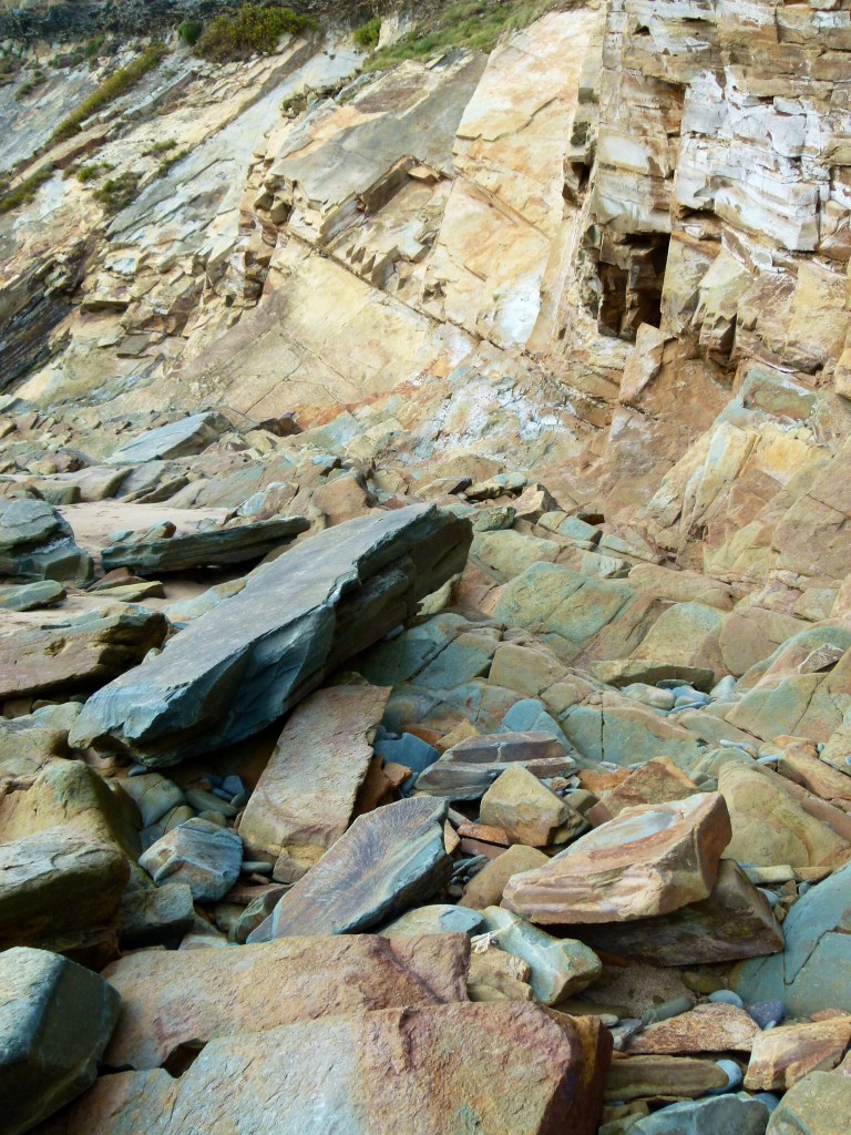 Rock colour and texture boulders and cliff in Silurian Period silt stones and sandstones from the Drompoint Formation in Dingle