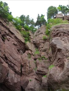 Red cliffs at Hopewell Rocks in New Brunswick