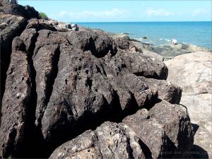 Structure of rocks on the outcrop with the Lookout near Four Mile Beach in Port Douglas