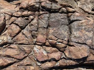 Fracture pattern in rusty rock by the Lookout outcrop near Four Mile Beach in Port Douglas