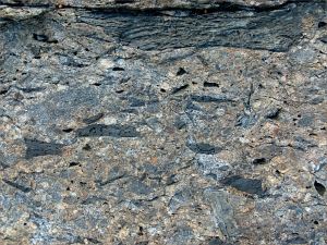 Colour and texture, possibly showing evidence of extrusive volcanic activity, in a rock outcrop near Four Mile Beach in Port Douglas