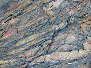 Colour and texture, possibly showing evidence of extrusive volcanic activity, in a rock outcrop near Four Mile Beach in Port Douglas