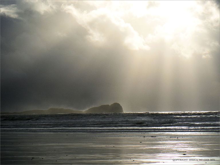 Cloud burst and sun shafts over Worms Head on the Gower Peninsula