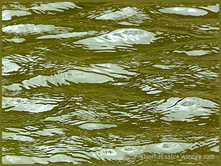 Light reflected on rippled water