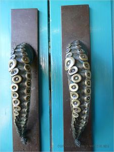 Door handles fashioned as suckered octopus arms
