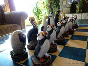 Carved and painted seabird chess pieces at Overleaf Lodge in Yachats, Oregon.