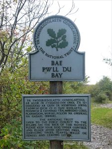National Trust signpost at Pwll Du Bay