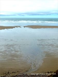 Silvery sand patterns at Rhossili Bay