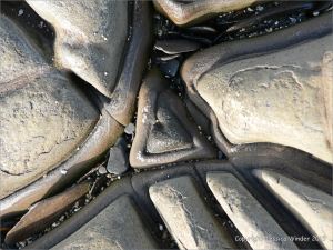 Interesting triangular design in rock pavement at Kimmeridge Bay in Dorset, England